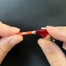 Load image into Gallery viewer, Replacing ear wax filter on Vivtone hearing aid