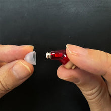Load image into Gallery viewer, Vivtone hearing aid eartip being detached, ear wax filter replacement