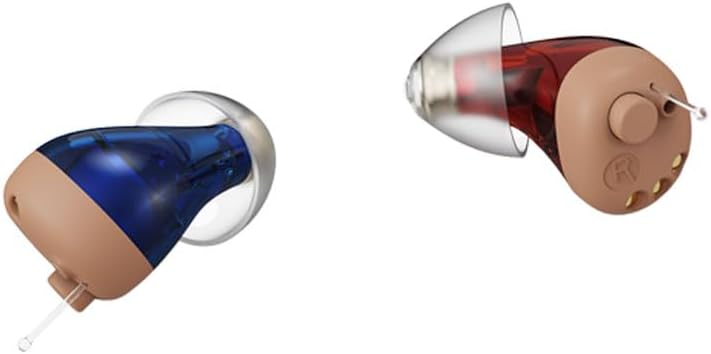 Close-up of Vivtone hearing aids with ear domes, different angle